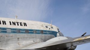Old aircraft showing square window design.